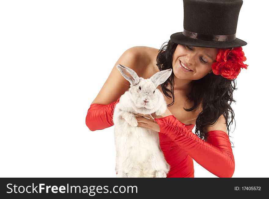 Closeup portrait of a cute magician with bunny against white background. Closeup portrait of a cute magician with bunny against white background