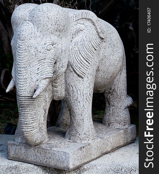 Elephant statue by stone stay at outdoor