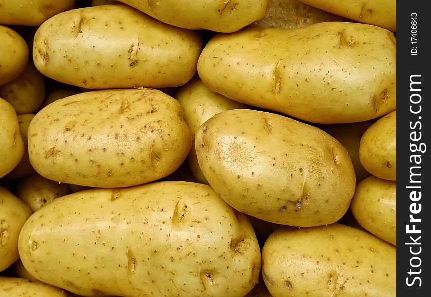 Fresh yellow market potatoes in Paris France