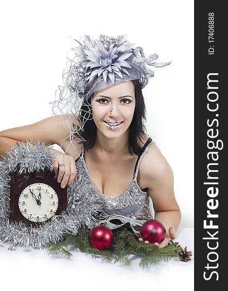 Cheerful girl bodyart with Christmas red ball and hours.