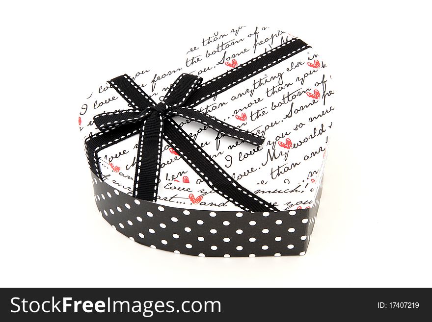 Isolated black and white holiday gift box in hear