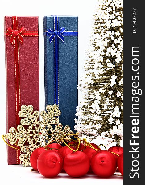 Red and blue holiday box with christmas tree and ornament. Red and blue holiday box with christmas tree and ornament