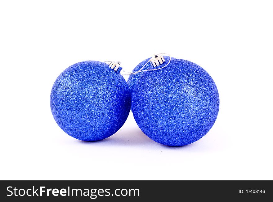 Three blue christmas crystal ball on white background, against a white background. Three blue christmas crystal ball on white background, against a white background