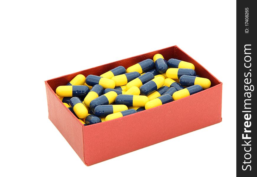 Yellow blue capsules in red box