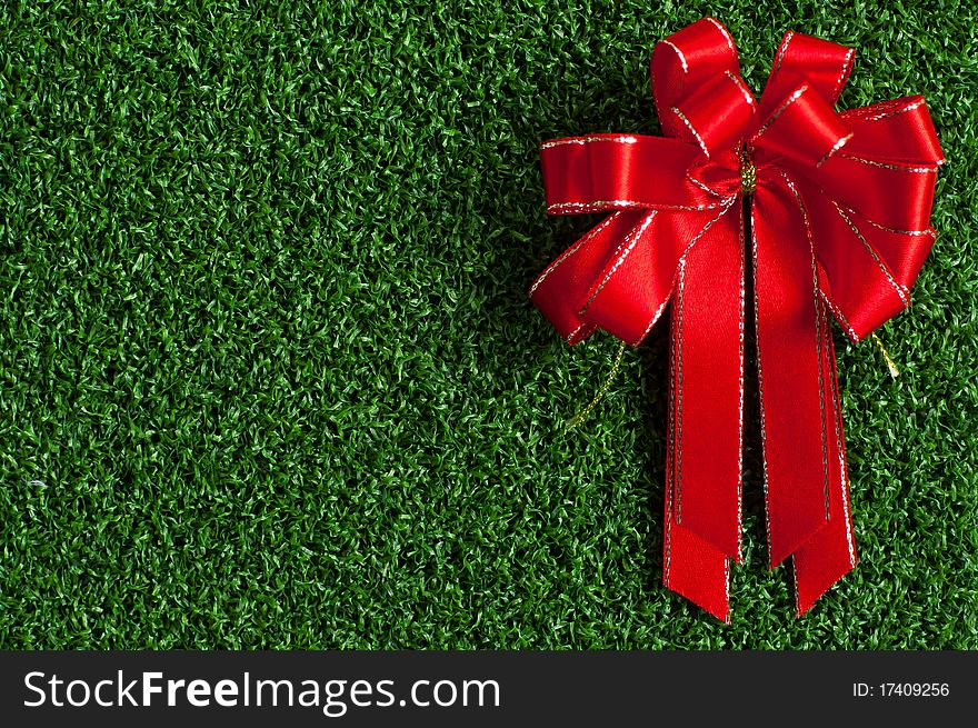 Red Bow Christmas on green background