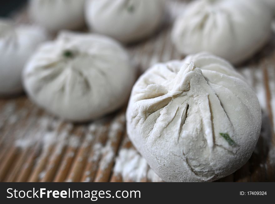 Closeup view of delicious and good looking steamed dumplings or baozi in China. Closeup view of delicious and good looking steamed dumplings or baozi in China