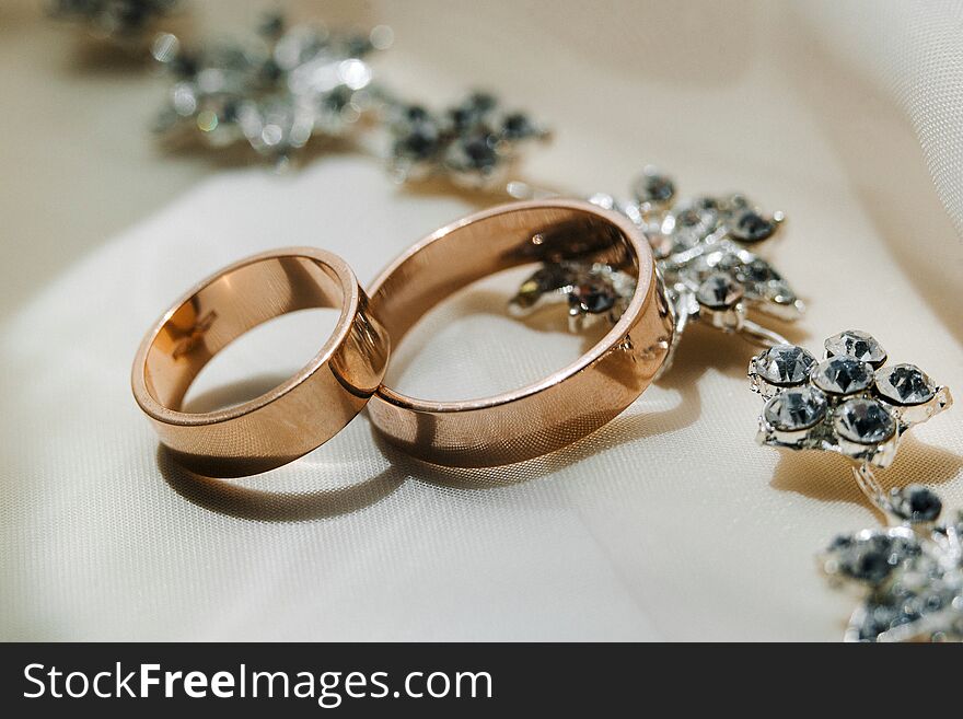 Two Golden Wedding Rings On The Cloth