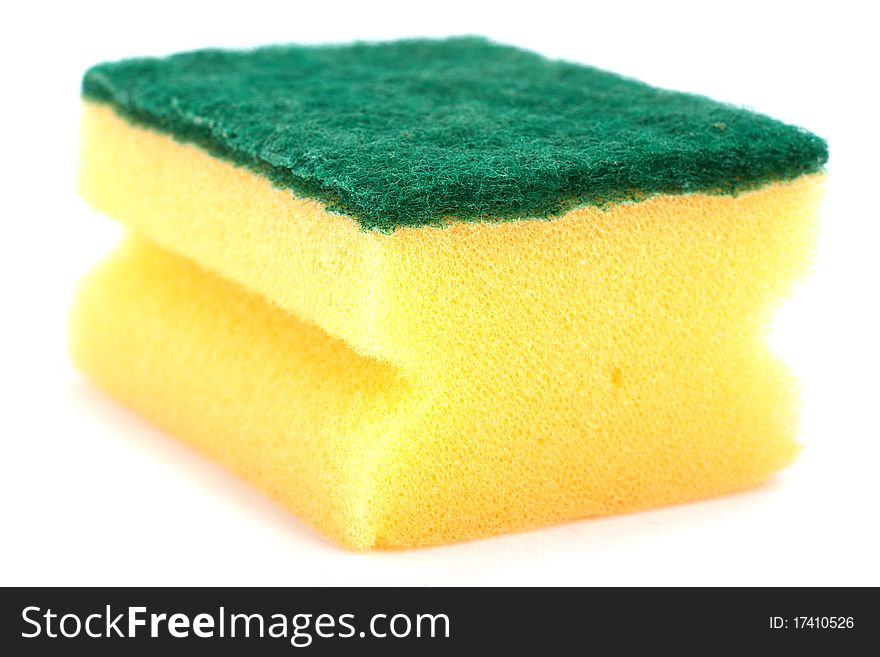 Yellow sponge isolated on white background.