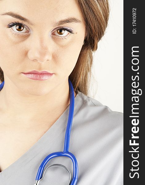 Young Woman Doctor Or Nurse Wearing Scrubs