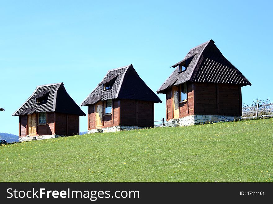 Three huts on the hill