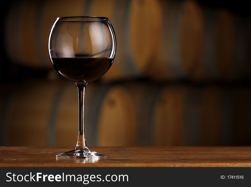 Glass Of Wine In Wine Cellar