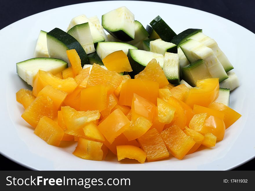 Zucchini and yellow peppers as side dish