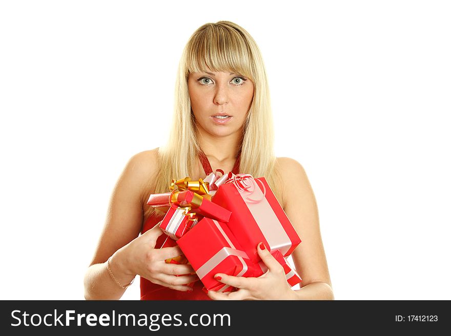 Beautiful girl in a red dress with lots of red gift boxes for Christmas. Surprised. Lots of copyspace and room for text on this isolate. Beautiful girl in a red dress with lots of red gift boxes for Christmas. Surprised. Lots of copyspace and room for text on this isolate