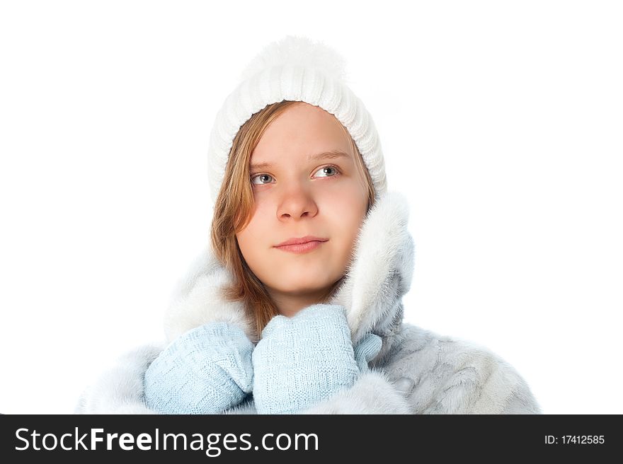 Cute little girl in warm clothes on white background