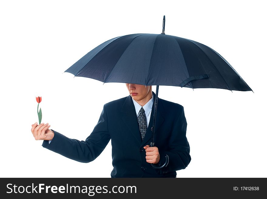 Young man with an umbrella on a white background