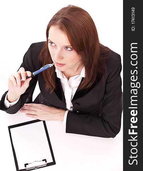 Exams passing. Young woman sitting at the table.