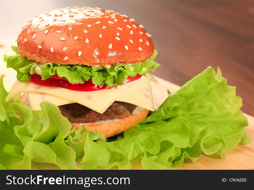 Appetizing cheeseburger. Isolated over white background. Appetizing cheeseburger. Isolated over white background.