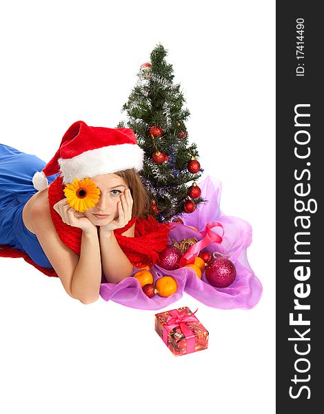 Young beautiful woman with a Christmas gift and tangerines. Young beautiful woman with a Christmas gift and tangerines.