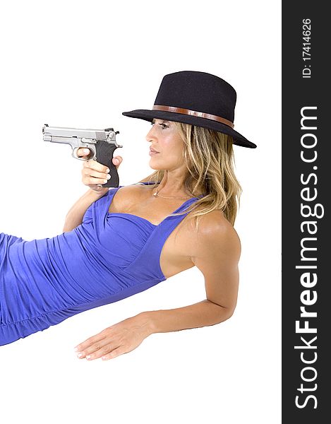 Woman with a gun in her hand. Woman with a gun in her hand