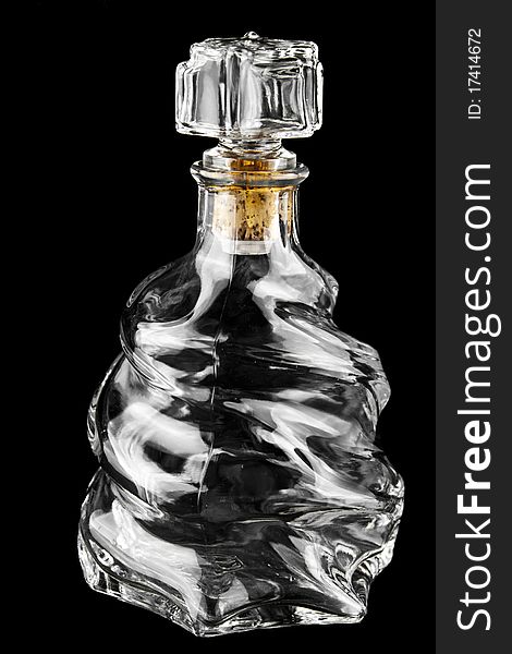 Empty spanish expensive bottle on black background. Empty spanish expensive bottle on black background