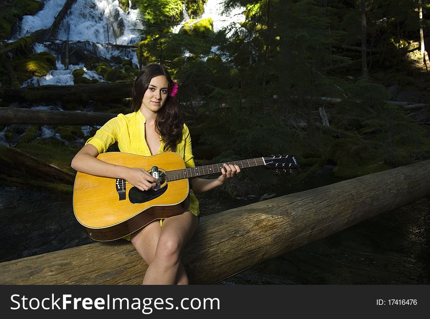 Young Woman Playing Guitar