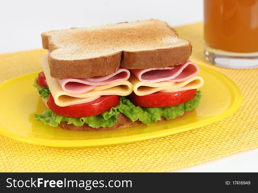 ham and cheese sandwich with lettuce and tomato