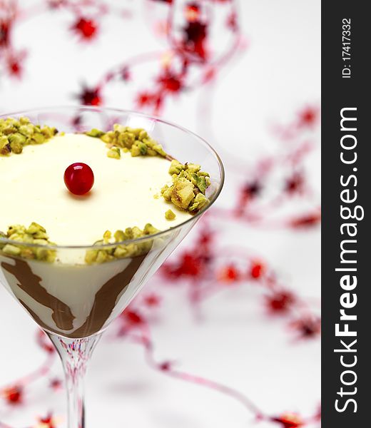 A bicolored pannacotta with a christmas garland