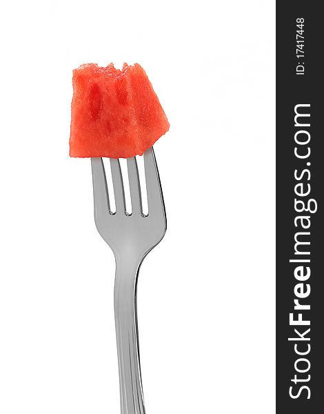 Metal fork with a piece of watermelon