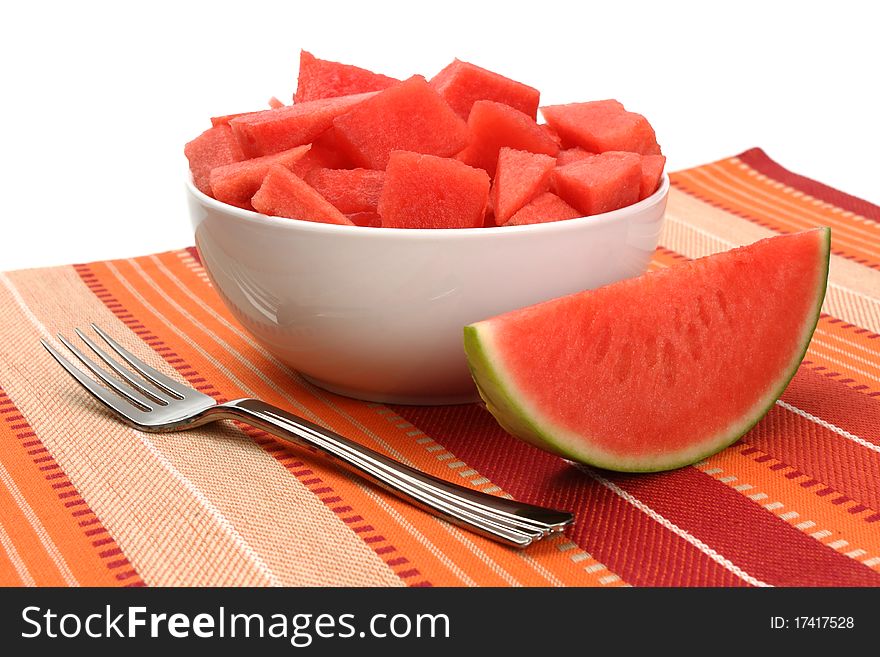 Plate of watermelon cut into chunks