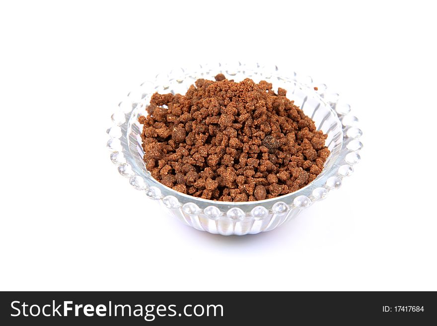 High protein dog food granules isolated on white background.