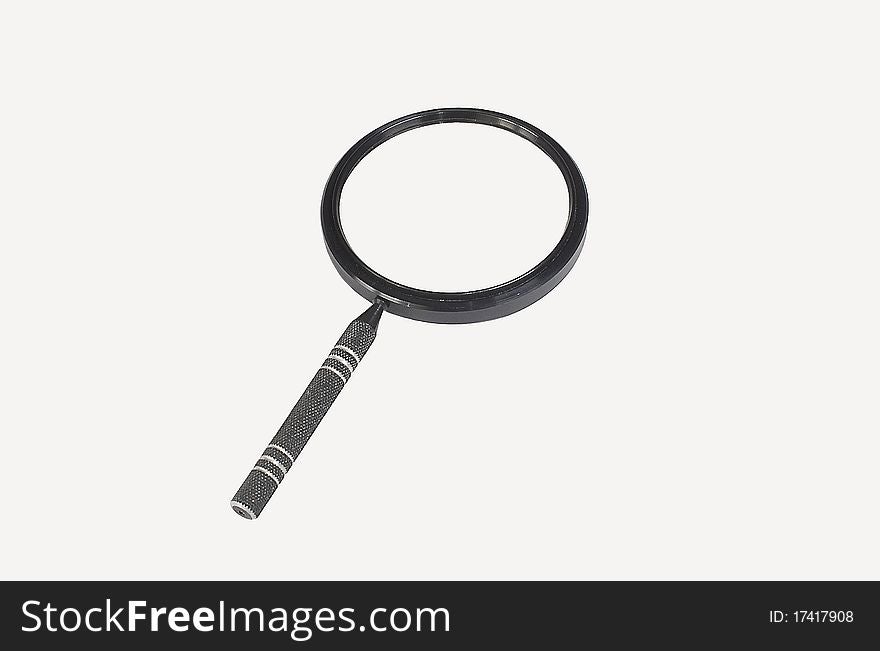 The magnifier isolated on the white