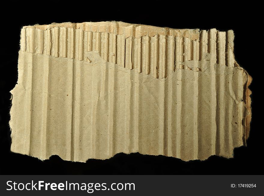 Torn section of a corrugated carton. Torn section of a corrugated carton