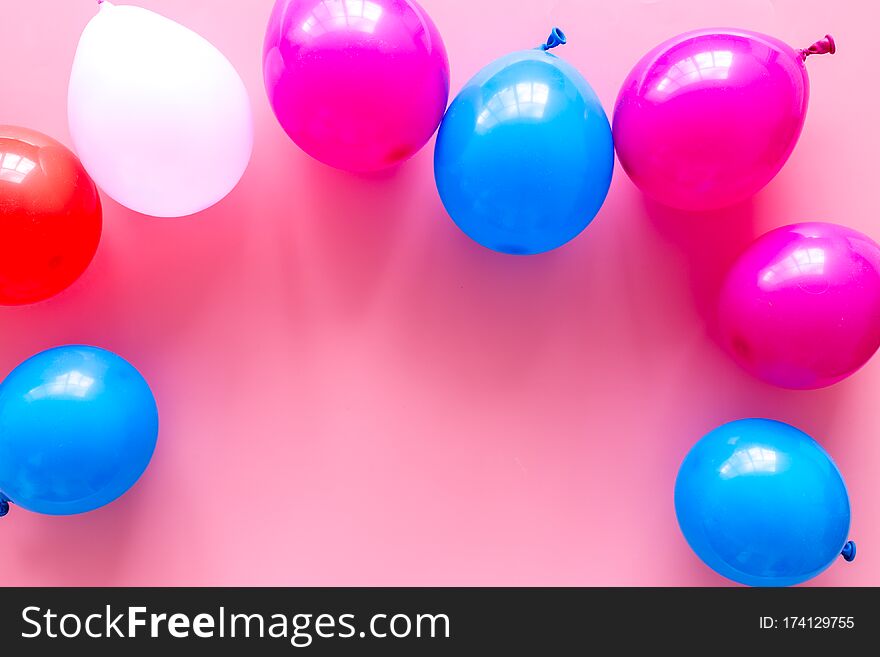 Decorative frame with colorful balloons on pink background top-down. Decorative frame with colorful balloons on pink background top-down.