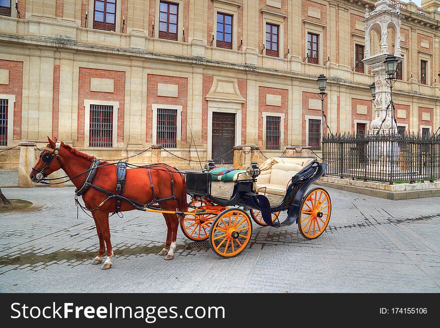 Horse Carriage In Front Of Seville Santa Maria Cathedral