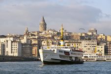 Galata Tower And Passenger Ship Royalty Free Stock Image
