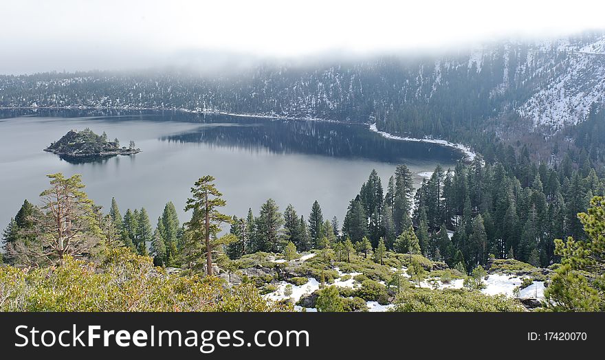 Lake Tahoe Emerald Bay in winter snow and clouds