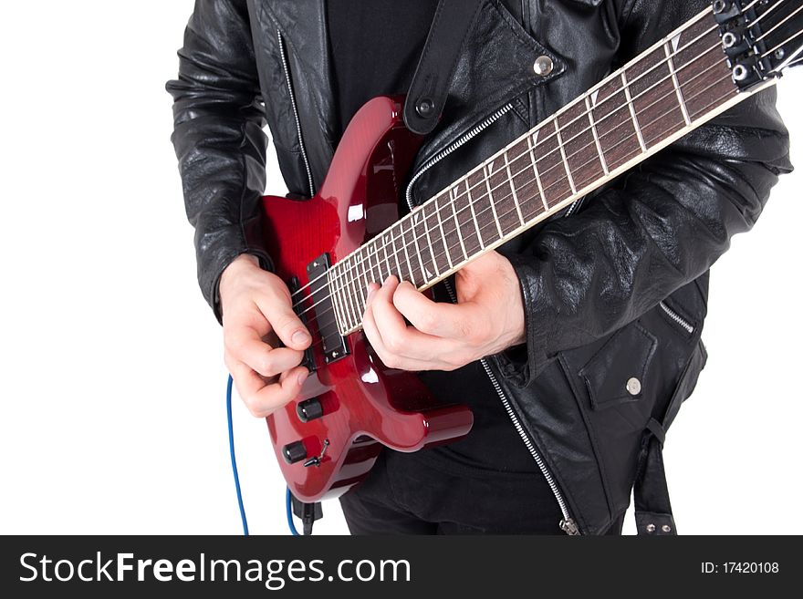 Rocker playing guitar isolated on white background