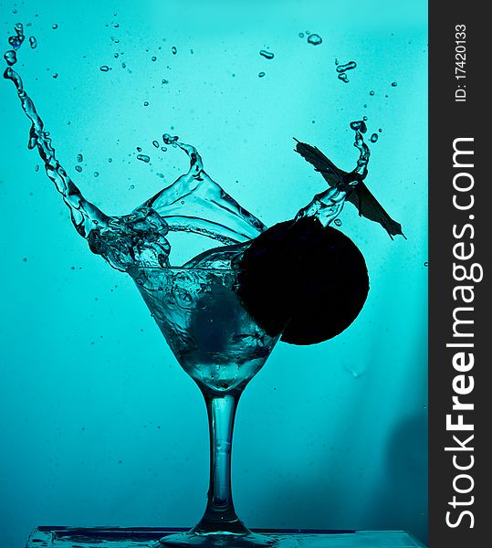 Drink splashes on blue background. Drink splashes on blue background