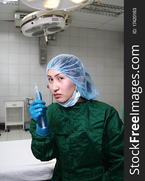 Picture of a nurse holding a syringe