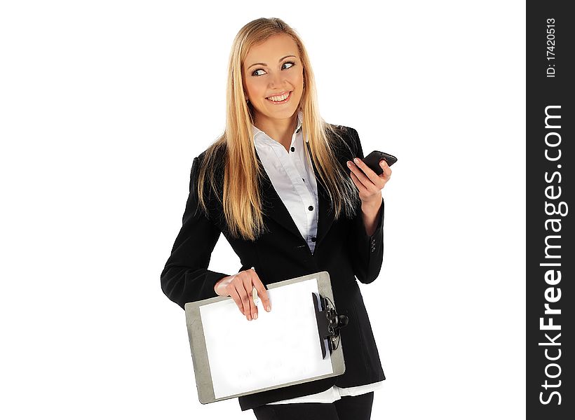 Business girl smiling while texting message on mobile phone