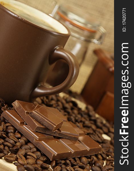 Coffee with chocolated on dark background. Coffee with chocolated on dark background