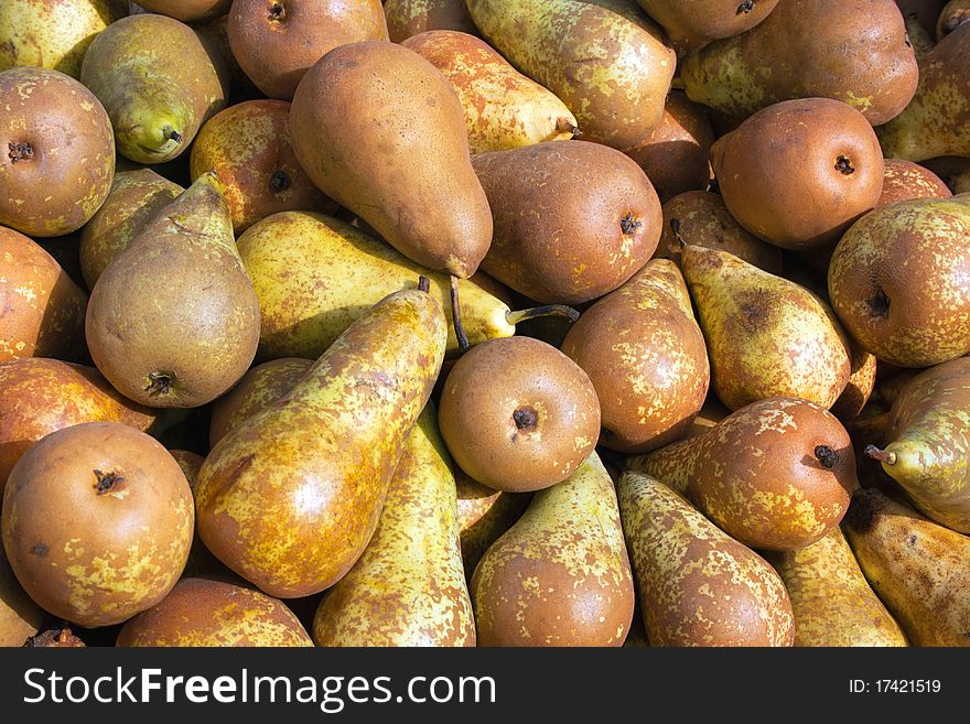 Fresh ripe yellow pears at the market