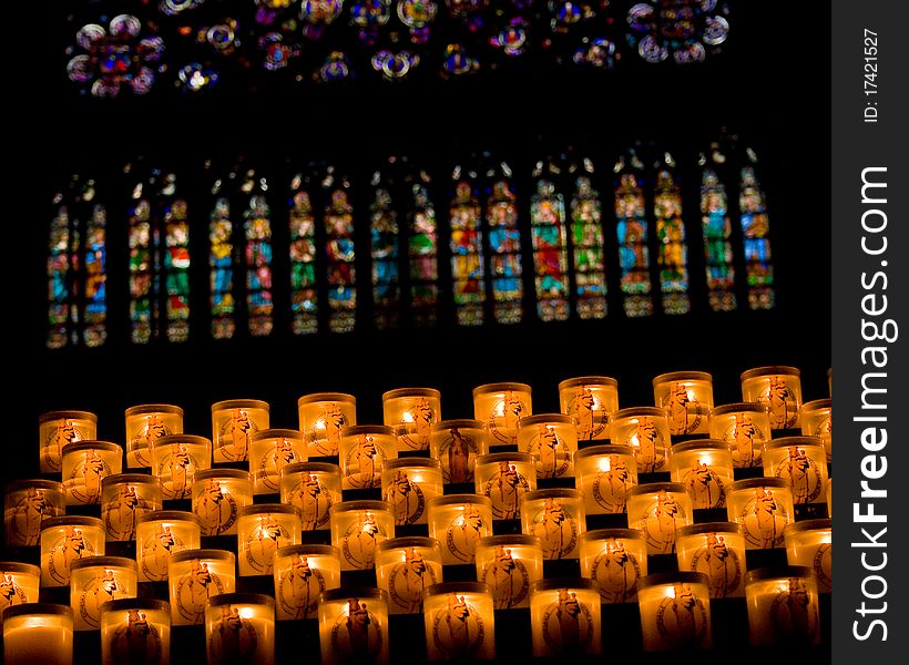 Lit candles at a prayer service in church. Lit candles at a prayer service in church.
