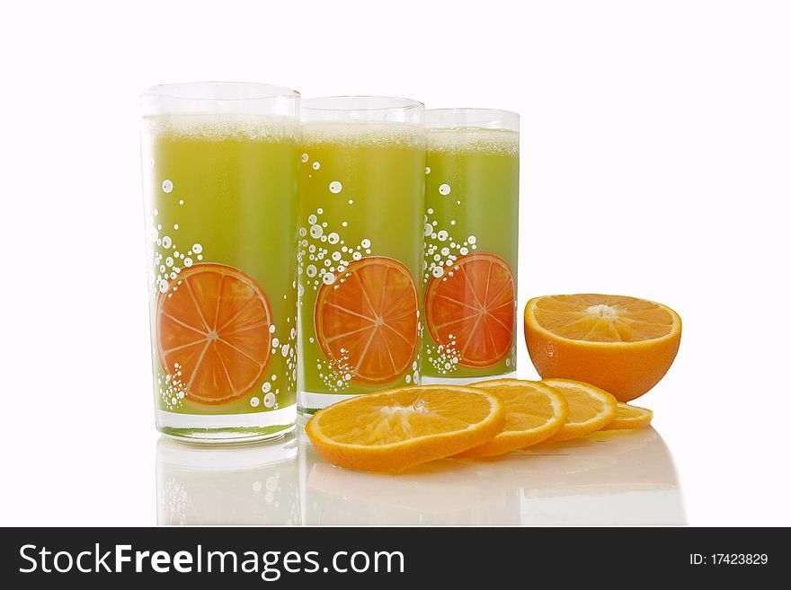 Green glasses wiht orange slices isolated