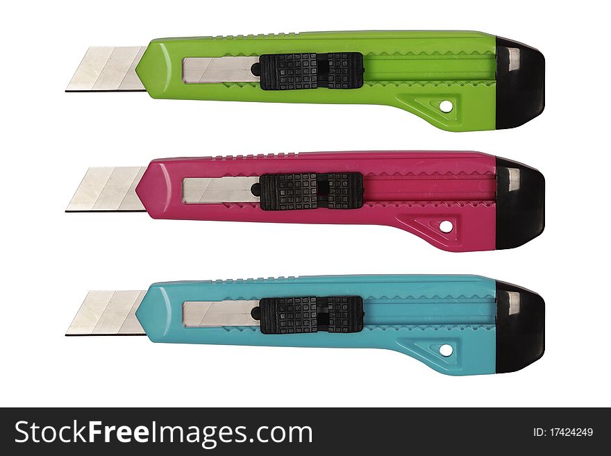A set of three retractable knifes in different colors