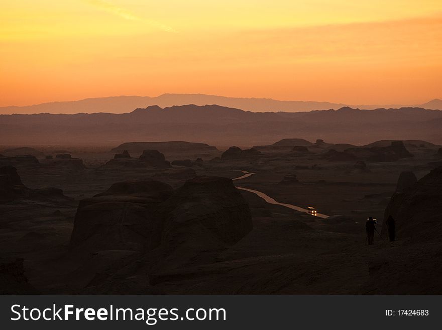 Two photographer were waiting for sunset.Xinjiang province,China.