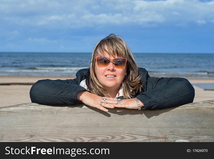 Woman Relaxing At The Sea.