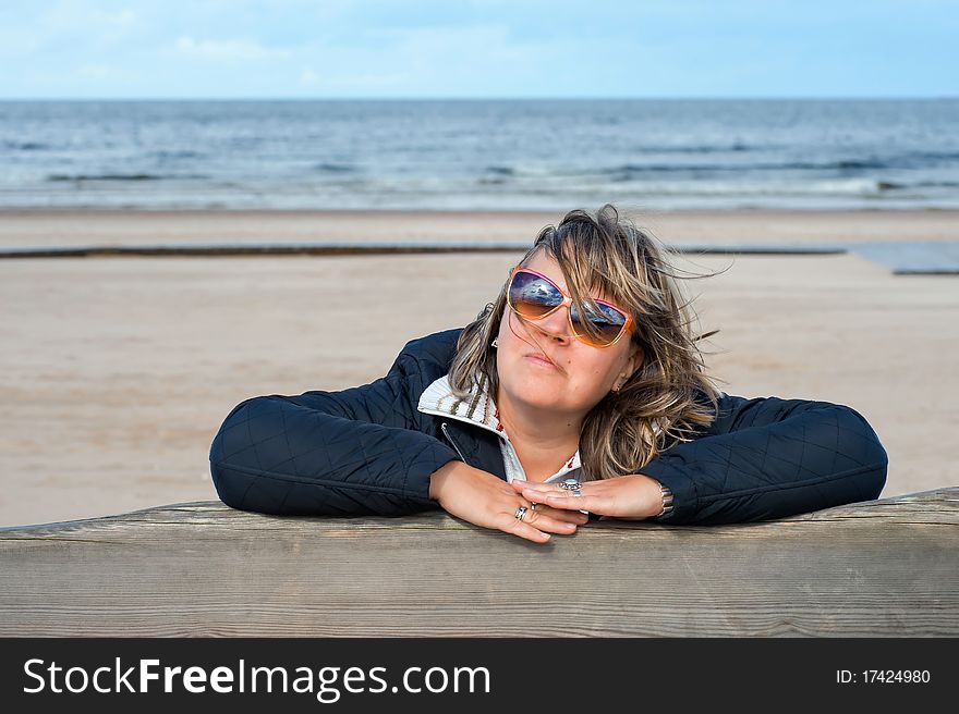 Woman Relaxing At The Sea.