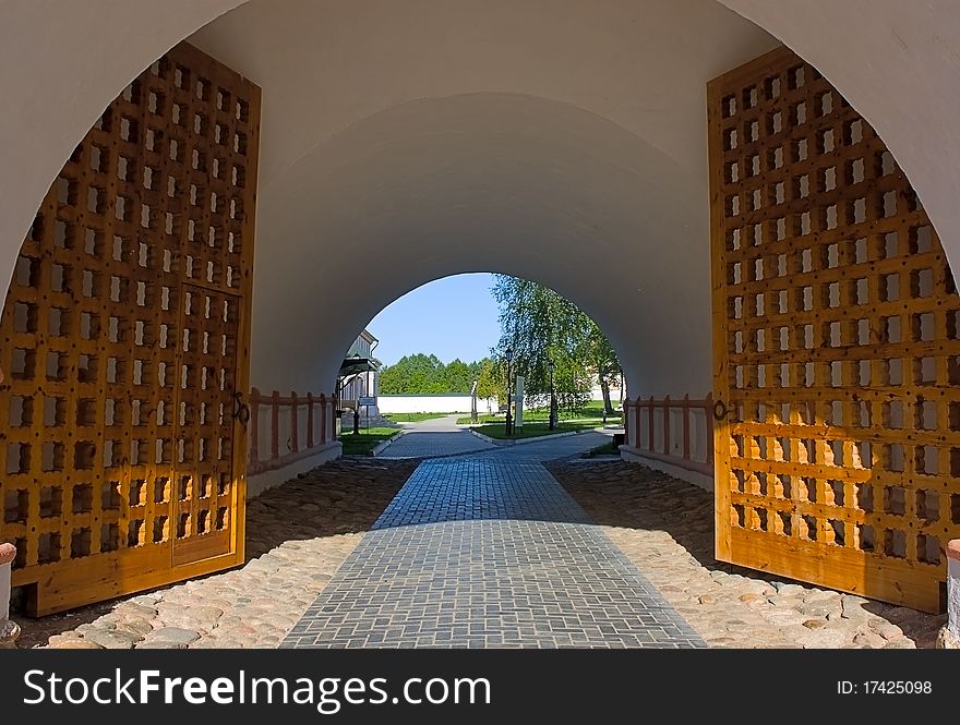 Gate with  arch in  monastery courtyard, Iversky Monastery, Russia.