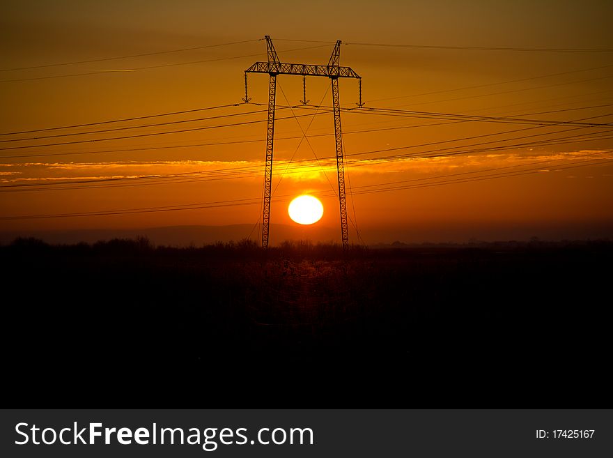 Beautifull sunset behind power line. Beautifull sunset behind power line